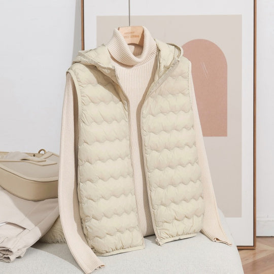 Damen Ultraleichte Kapuzen-Steppweste mit ergonomischer Wellensteppung und kompaktem Packformat Nord Taschen