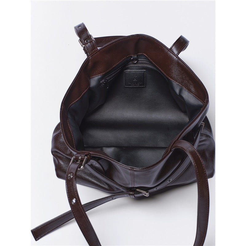 Damen Schultertasche mit eleganter Struktur und modischen Metallakzenten Nord Taschen
