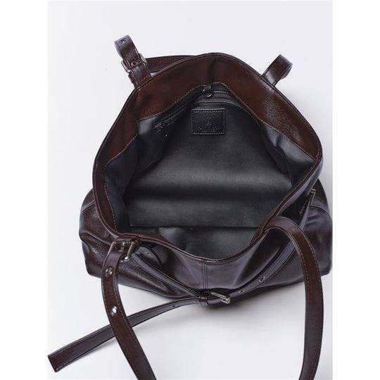 Damen Schultertasche mit eleganter Struktur und modischen Metallakzenten Nord Taschen