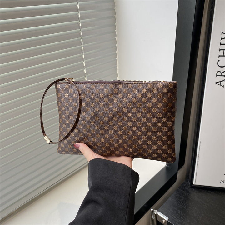 Damen Clutch mit elegantem Ringgriff Nord Taschen