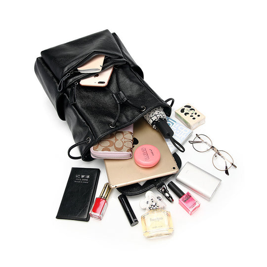 Damen Rucksackhandtasche aus hochwertigem Kunstleder mit eleganter Klappenfront Nord Taschen