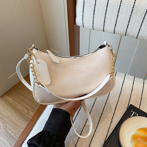 Damen elegante Umhängetasche mit feinem Kettenakzent Nord Taschen