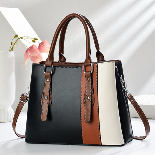 Damen Handtasche mit eleganten Farbakzenten und vielseitigem Tragegurt Nord Taschen