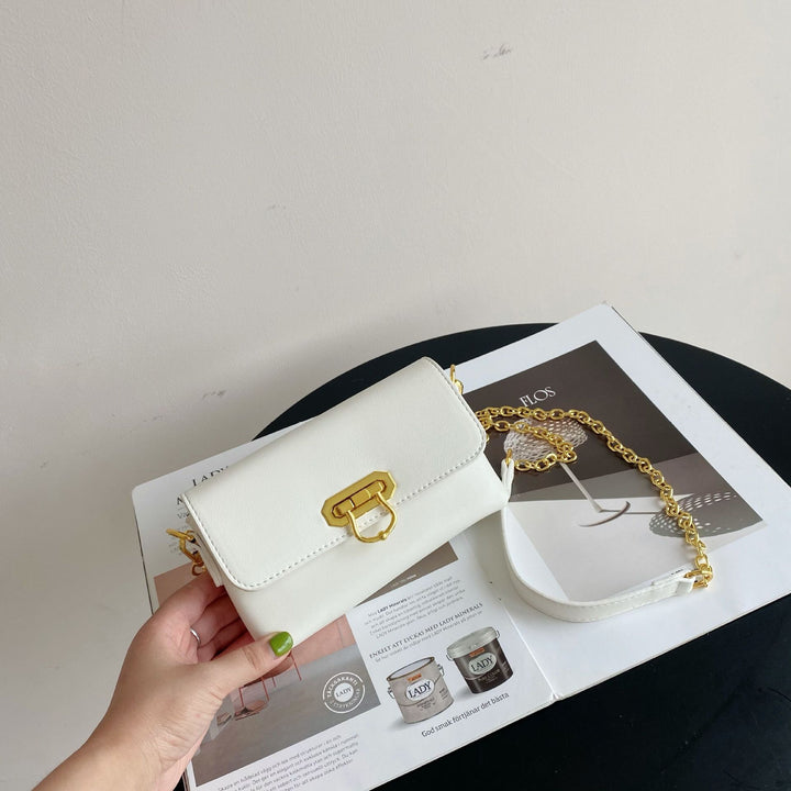 Damen Umhängetasche mit elegantem Kettenriemen und klappbarem Verschluss Nord Taschen