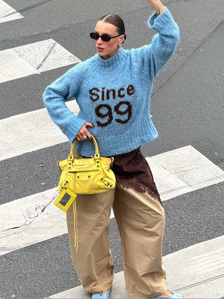 Damen kuscheliger Oversize-Mohairpullover mit hohem Rollkragen und Statement-Logo Nord Taschen