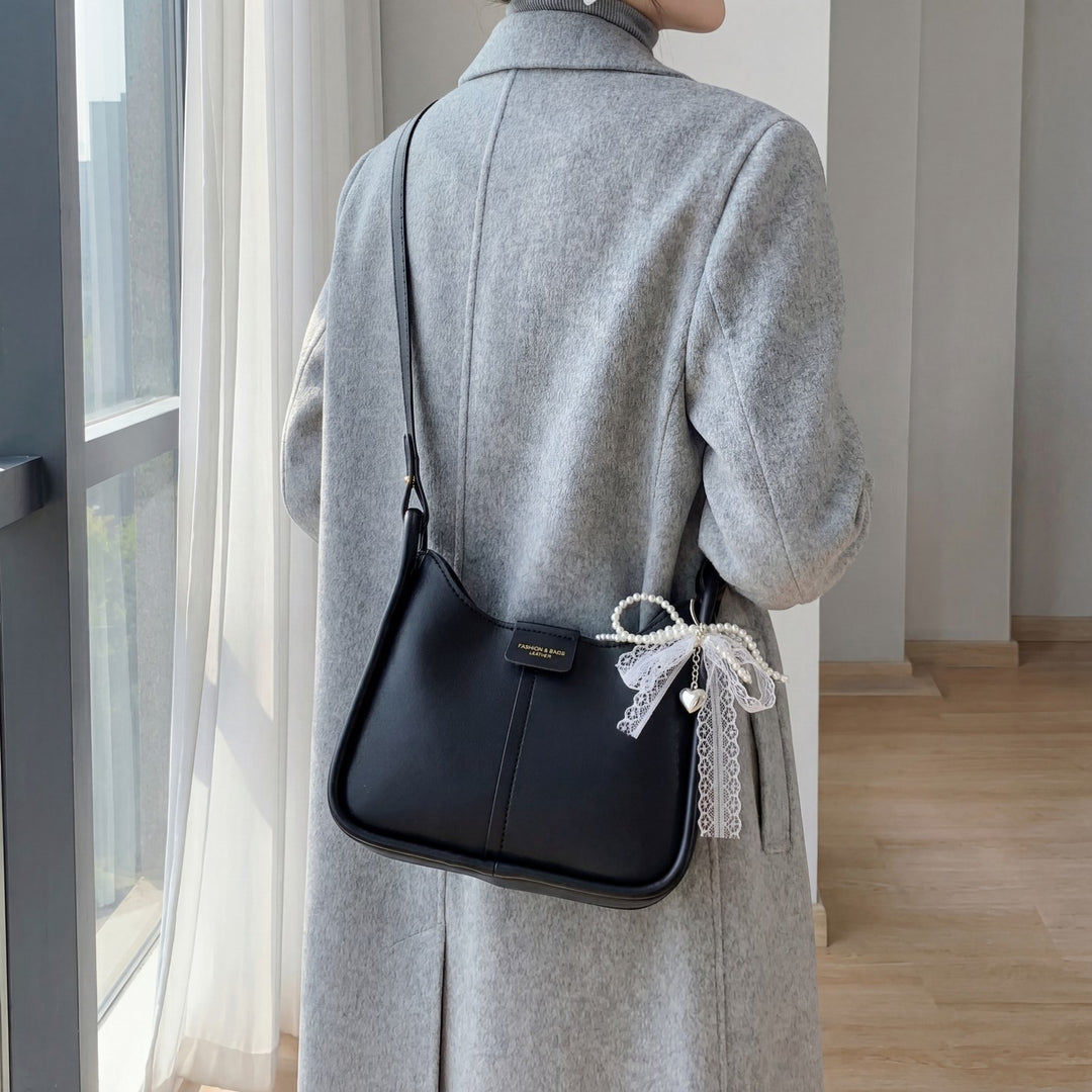 Damen Umhängetasche mit minimalistischer Form und verstellbarem Trageriemen Nord Taschen