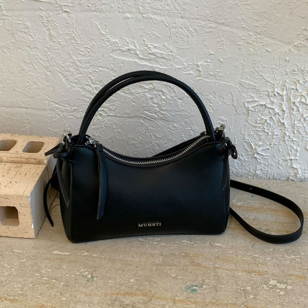 Damenhandtasche im charmanten Retro-Stil mit verspieltem Anhänger Nord Taschen