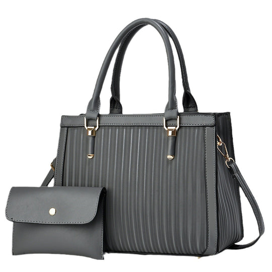 Damen elegante Handtasche mit Streifenstruktur und abnehmbarer Clutch Nord Taschen