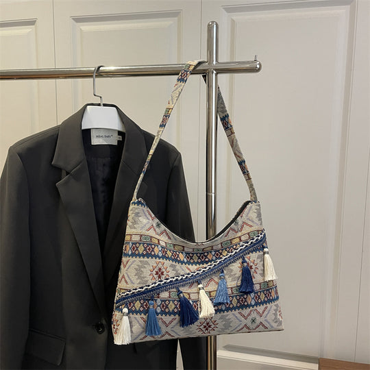 Damen trendige Umhängetasche mit farbenfrohem Muster und Fransen Nord Taschen