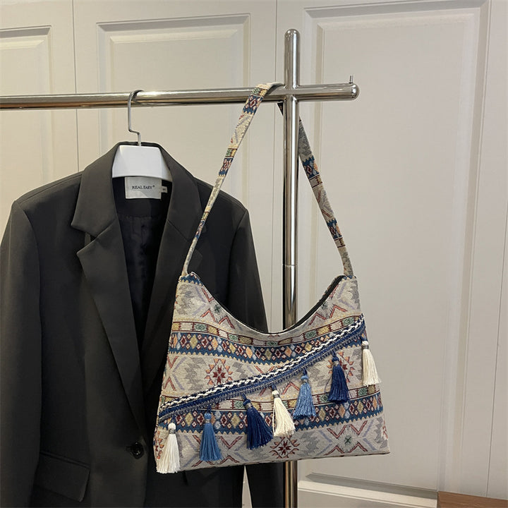 Damen trendige Umhängetasche mit farbenfrohem Muster und Fransen Nord Taschen
