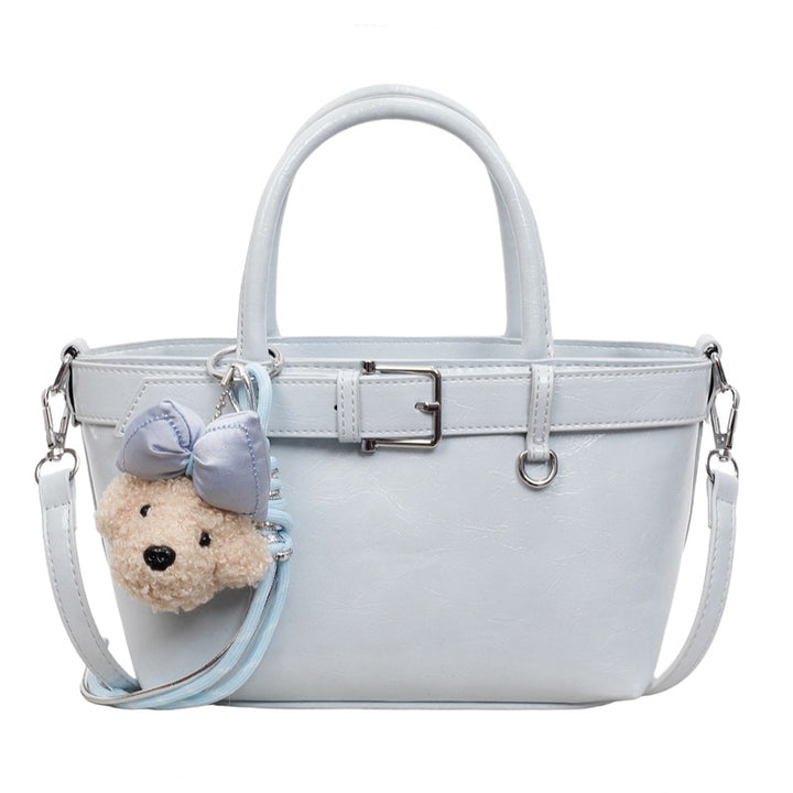 Damen Handtasche mit plüschigem Tieranhänger Nord Taschen