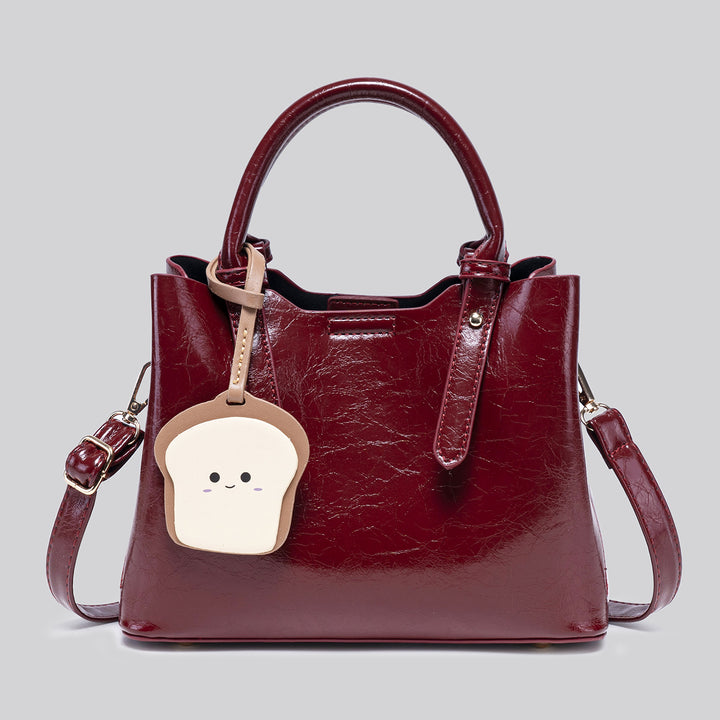 Damen modische Handtasche mit verspieltem Anhänger Nord Taschen
