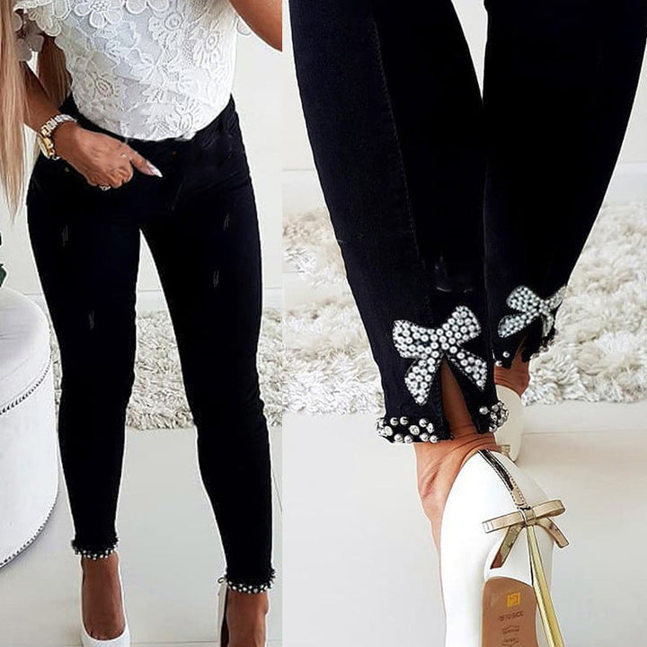 Damen Skinny Jeans mit Perlen- und Schleifendetails