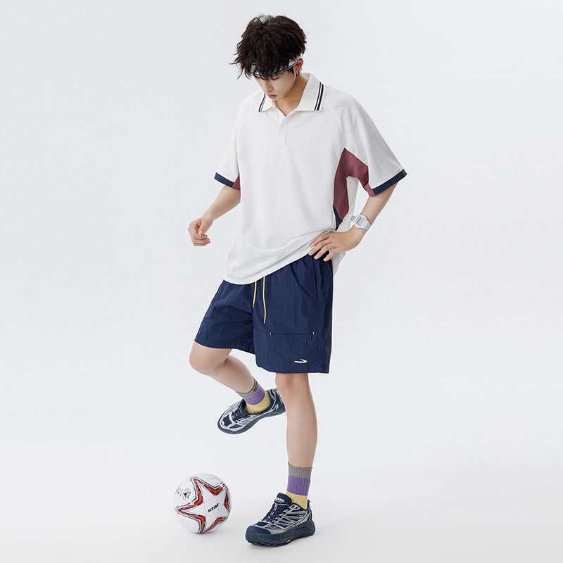 Unisex Boxy Oversize Polo-Shirt aus technischem Funktionsjersey mit Kontrastpaneelen und Raglanärmeln Nord Taschen