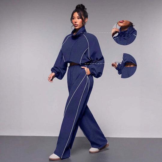 Damen sportives Cropped Windbreaker-Set mit Stehkragen Tunnelzug und reflektierenden Paspeln Nord Taschen