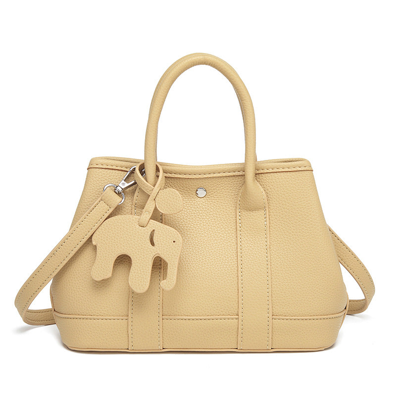 Damen Handtasche mit abnehmbarem Elefantenanhänger und elegantem Kunstleder Nord Taschen