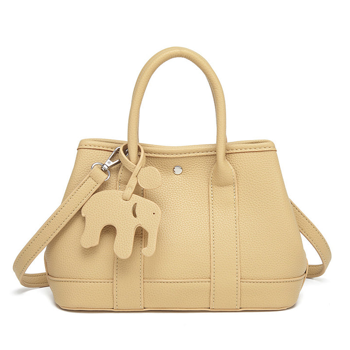 Damen Handtasche mit abnehmbarem Elefantenanhänger und elegantem Kunstleder Nord Taschen