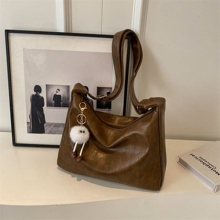 Damen Handtasche mit verspieltem Schlüsselanhänger Nord Taschen