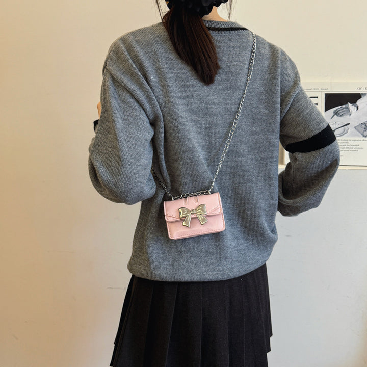 Damen Mini-Handtasche mit schimmerndem Schleifenverschluss Nord Taschen