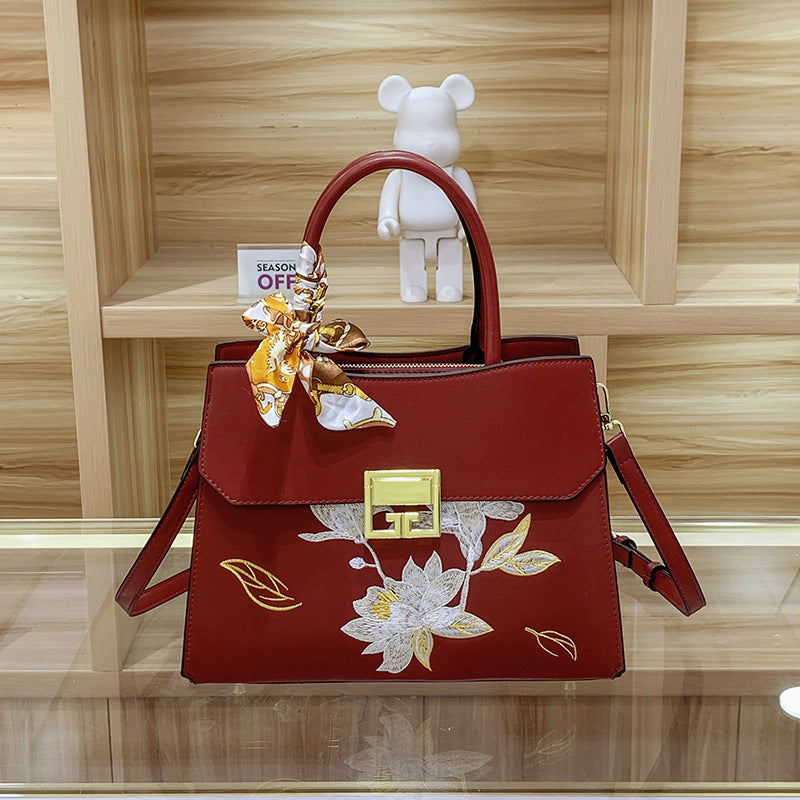 Damen Handtasche mit elegantem floralem Design und praktischen Trageoptionen Nord Taschen