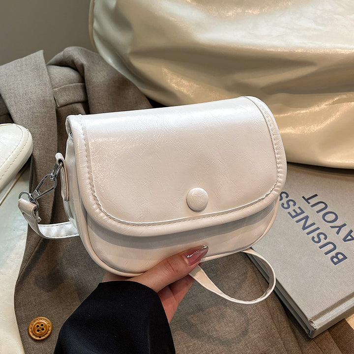 Damen Umhängetasche mit eleganter Klappöffnung und verstellbarem Schultergurt Nord Taschen