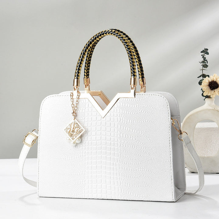 Damen elegante Handtasche mit luxuriöser Croco-Prägung und goldenen Akzenten Nord Taschen