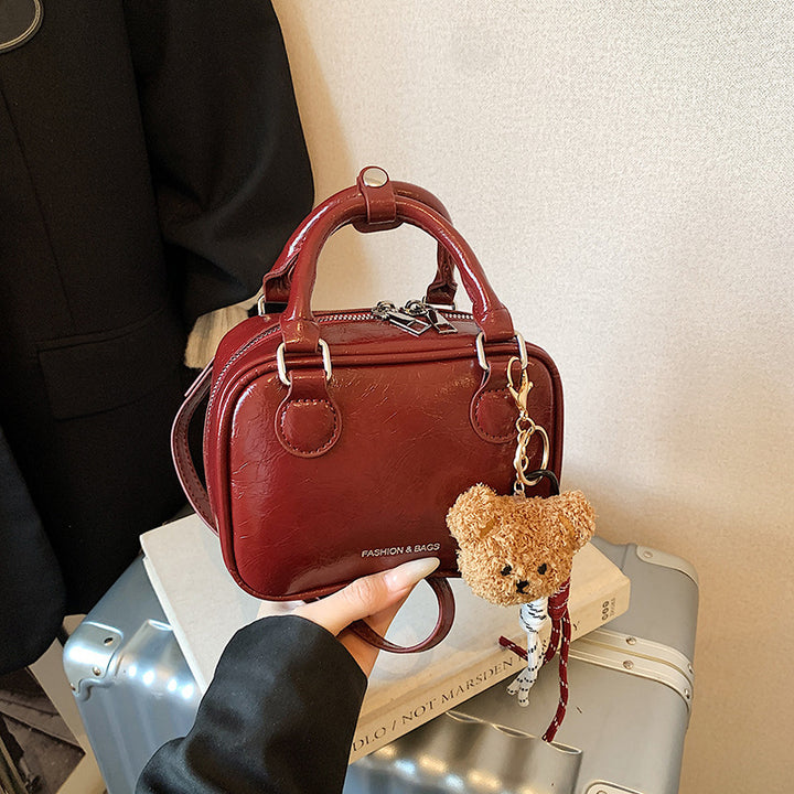 Damen Mini-Handtasche mit niedlichem Anhänger Nord Taschen