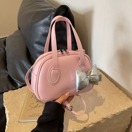 Damen Designer-Handtasche im verspielten Stil mit dekorativem Schleifen-Detail | Nord Taschen