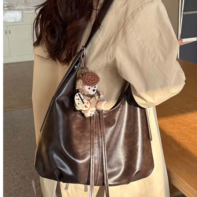Damen Hobo-Tasche aus geschmeidigem Kunstleder mit flexiblem Tragegriff Nord Taschen