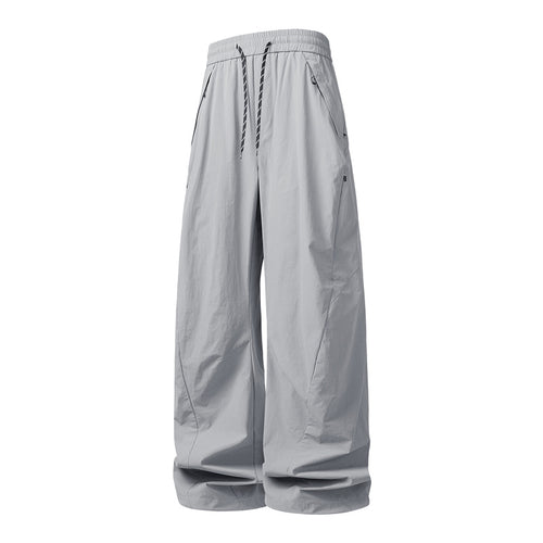 Unisex Weite Tech-Baggy-Hose mit elastischem Kordbund, Reißverschlusstaschen & wasserabweisender Nylonoptik Nord Taschen