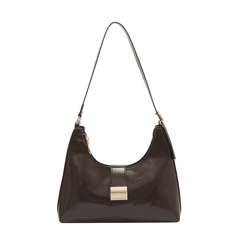 Damen elegante Handtasche mit glänzendem Obermaterial und innovativem Verschluss Nord Taschen