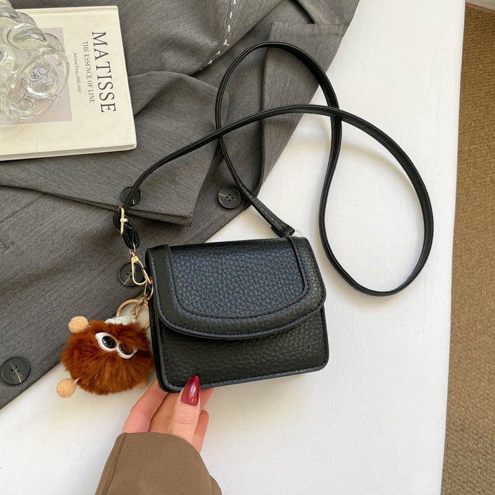 Damen praktische Mini-Umhängetasche mit verspieltem Anhänger Nord Taschen