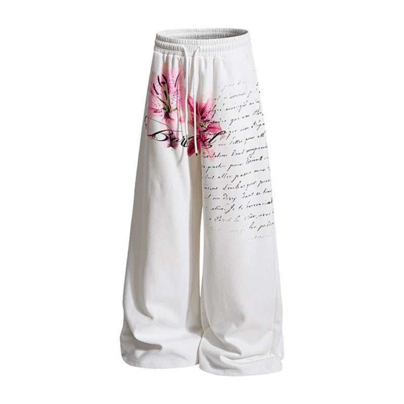 Damen Weite Palazzo-Loungehose im Culotte-Stil mit Komfortbund, Tunnelzug und floraler Printapplikation Nord Taschen