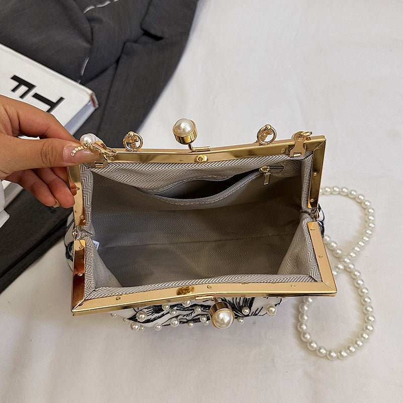 Damen Clutch-Tasche mit perlverziertem Blumenmuster und elegantem Metallverschluss Nord Taschen