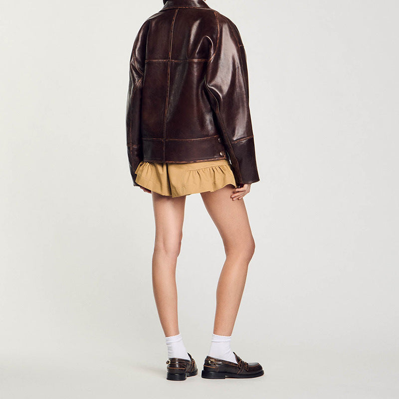 Damen Kurz geschnittene Oversize-Lederjacke mit Rundkragen und Pattentaschen Nord Taschen
