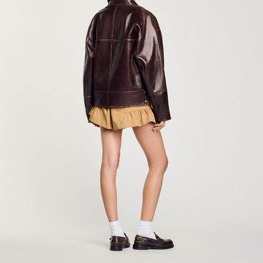 Damen Kurz geschnittene Oversize-Lederjacke mit Rundkragen und Pattentaschen Nord Taschen