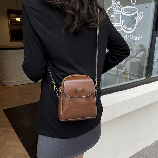Damen edle Umhängetasche mit elegantem Klappverschluss und verstellbarem Riemen Nord Taschen