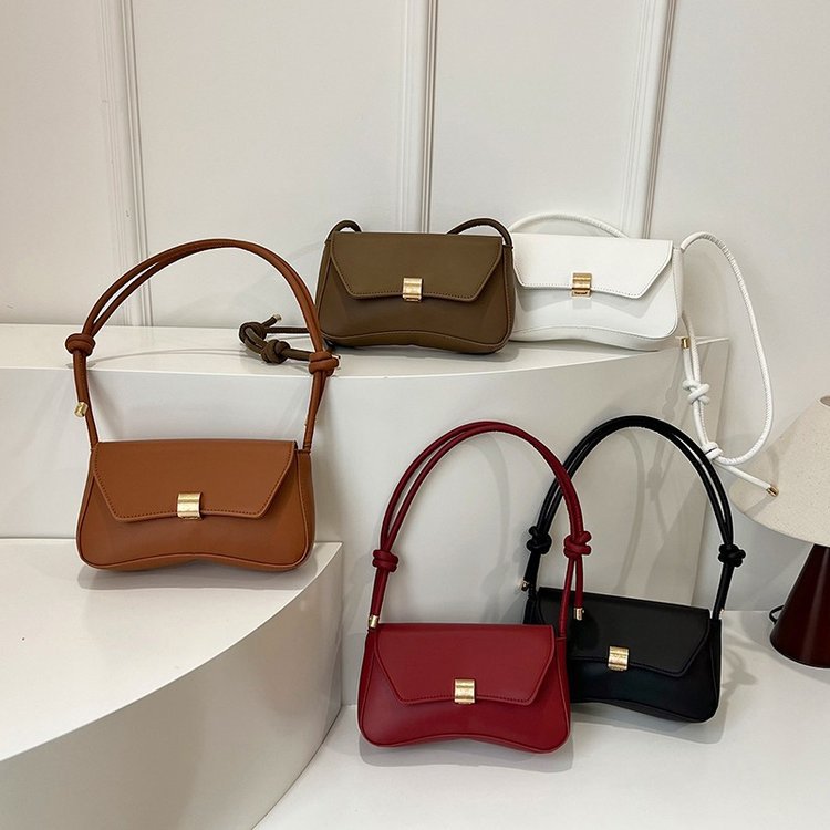 Damen Umhängetasche mit verstellbarem Tragegurt und eleganter Schnappverschluss Nord Taschen