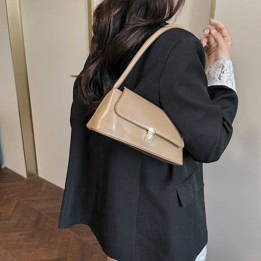 Damen elegante Handtasche mit geschwungenem Henkel Nord Taschen