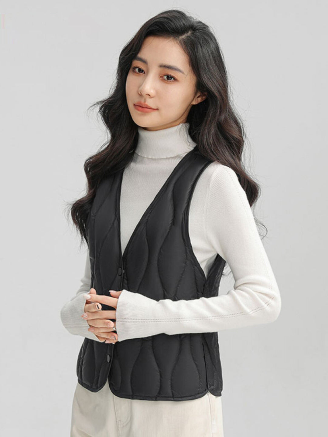 Damen Lange gesteppte Thermoweste mit ergonomischer Wellensteppung Nord Taschen