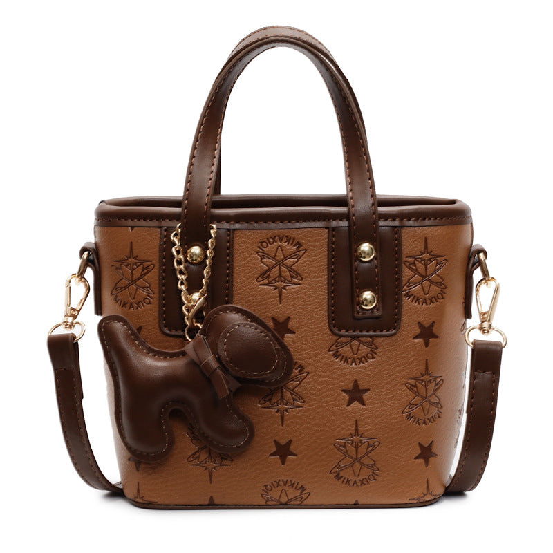 Damen Mini-Handtasche mit verspieltem Anhänger | Nord Taschen