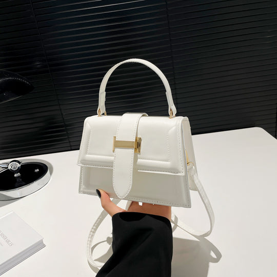 Damen elegante Handtasche mit praktischem Klappverschluss Nord Taschen