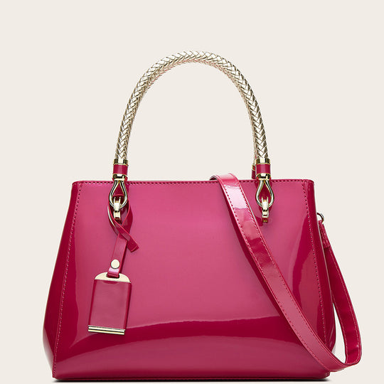 Damen Handtasche mit strukturierter, glänzender Oberfläche und geflochtenem Tragegriff Nord Taschen