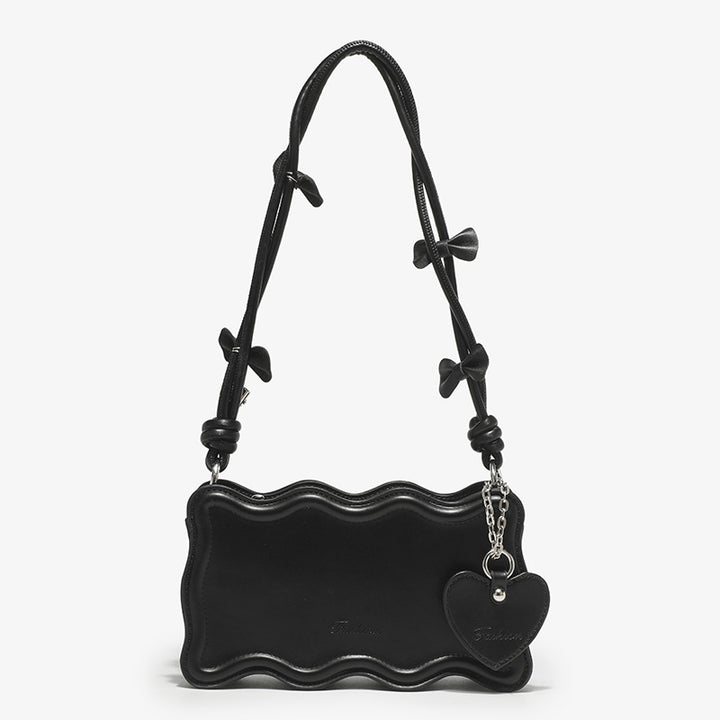 Damen Mini-Handtasche mit kreativem Wellenmuster und verspieltem Anhänger Nord Taschen