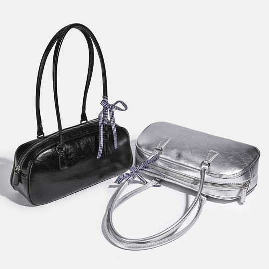 Damen Clutch mit glänzender Oberflächenstruktur und dekorativem Schleifenakzent Nord Taschen