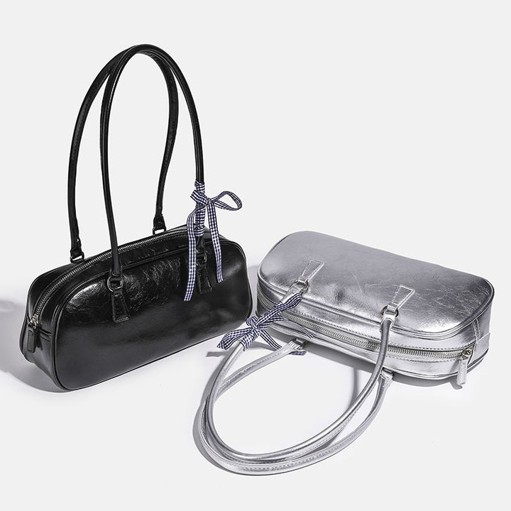 Damen Clutch mit glänzender Oberflächenstruktur und dekorativem Schleifenakzent Nord Taschen