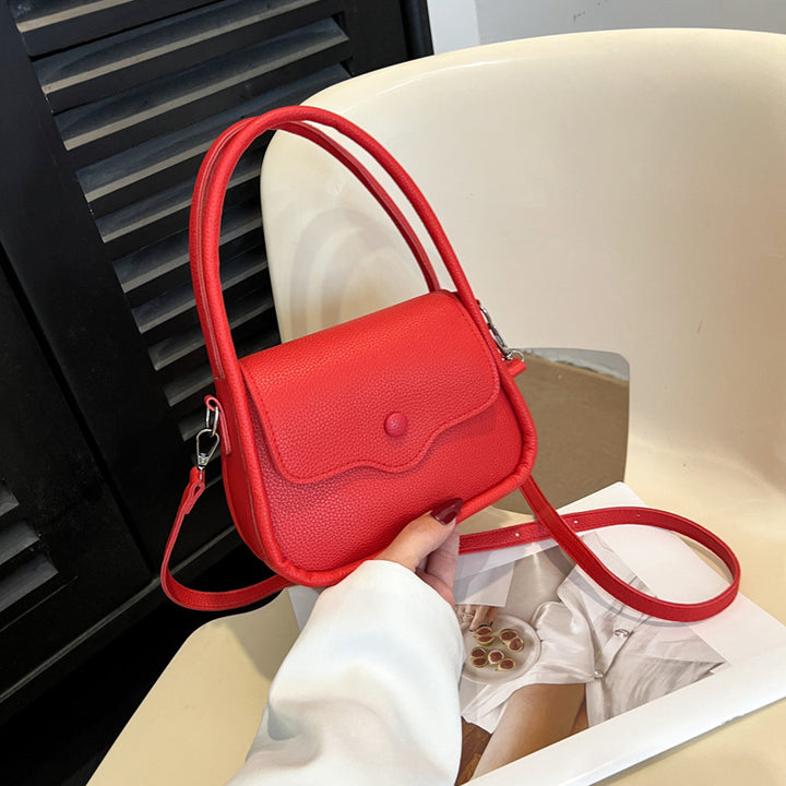 Damen Ledertasche mit dekorativer Klappenöffnung Nord Taschen