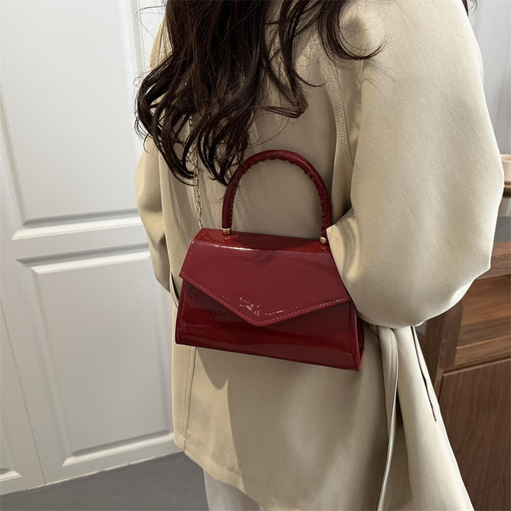 Damen elegante Handtasche im modernen Lacklederdesign Nord Taschen
