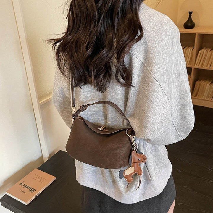Damen Umhängetasche mit charmantem Anhänger und elegantem Design Nord Taschen