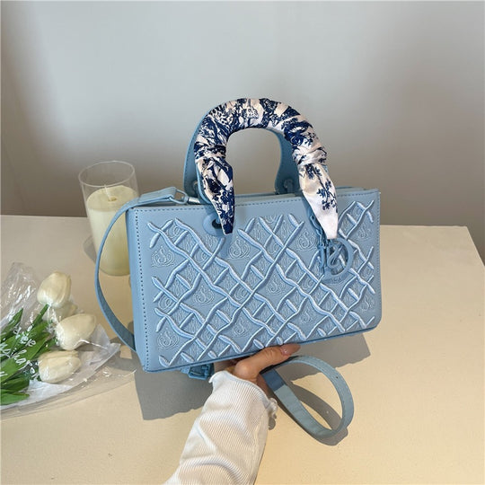 Damen elegante Handtasche mit strukturiertem Design und modischem Halsschal Nord Taschen
